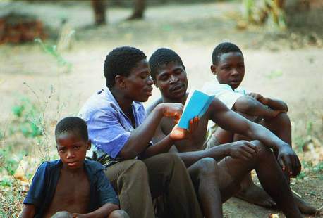 Boys reading together in Malawi, East Africa Boys reading together in Malawi, East Africa