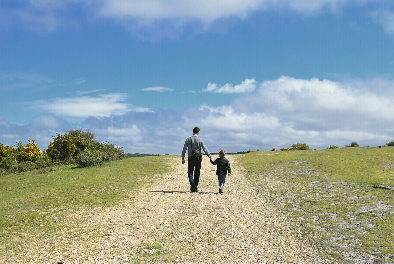 father and son walking