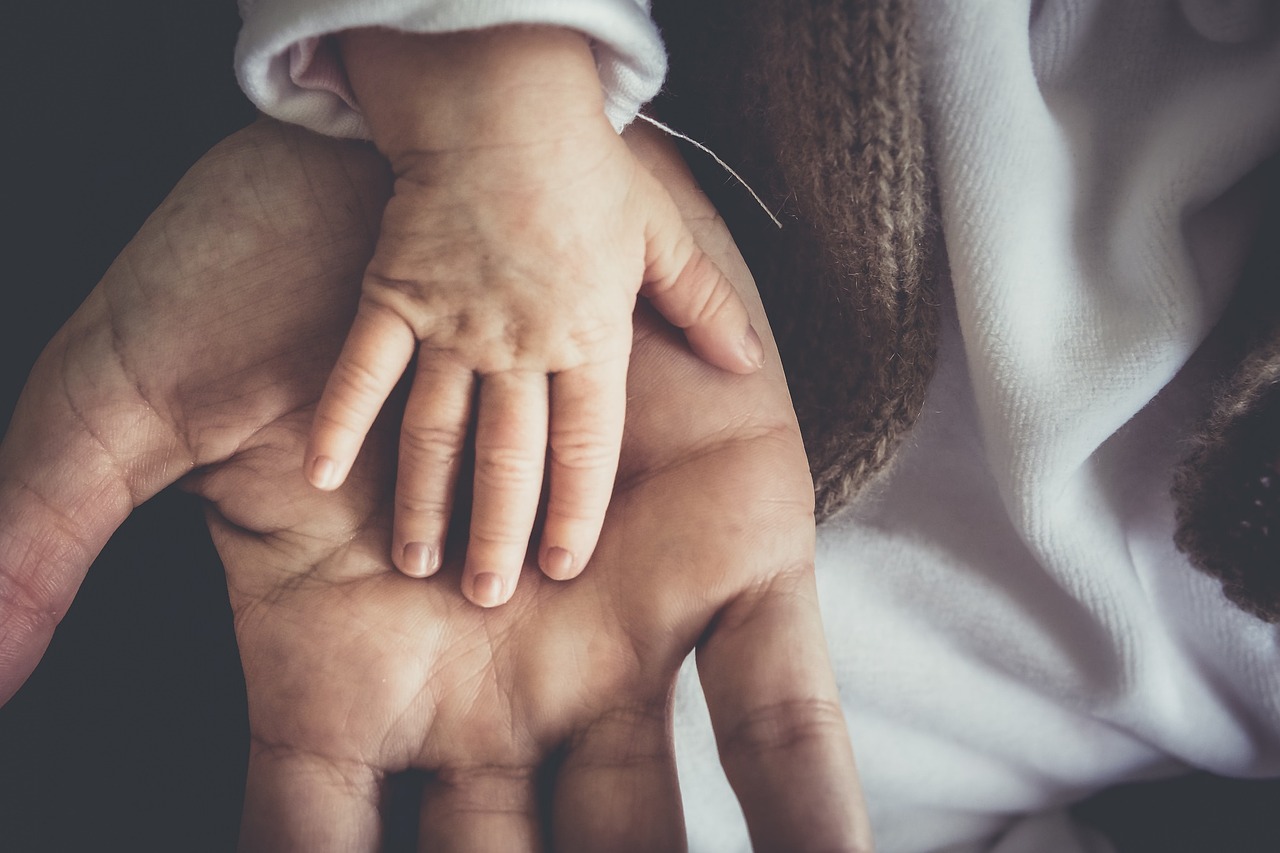 father and child hand