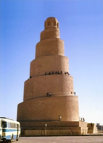 Spiral tower with modern day visitors climbing the spiral tower. 