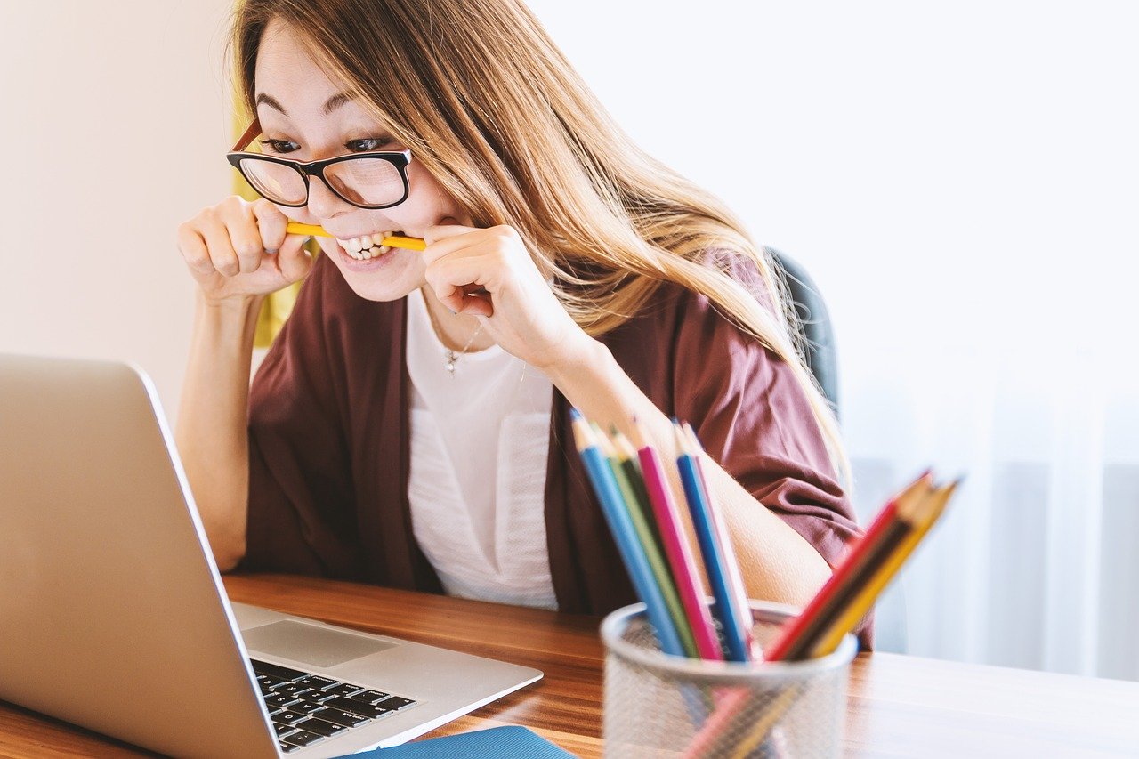 anxious woman with laptop